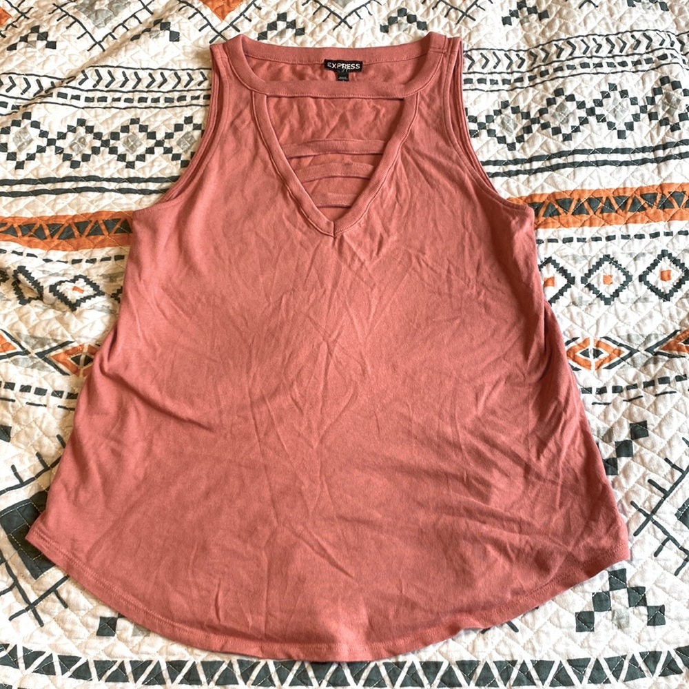 Express loose fit tunic with cutout on chest. size small